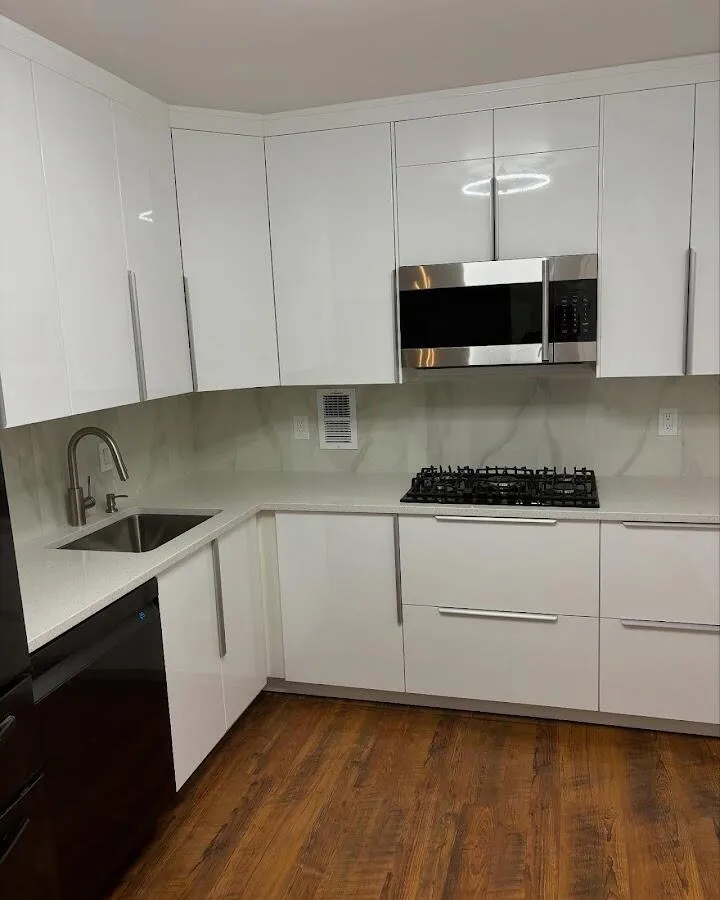 Restored kitchen with white cabinets after water damage in Withamsville